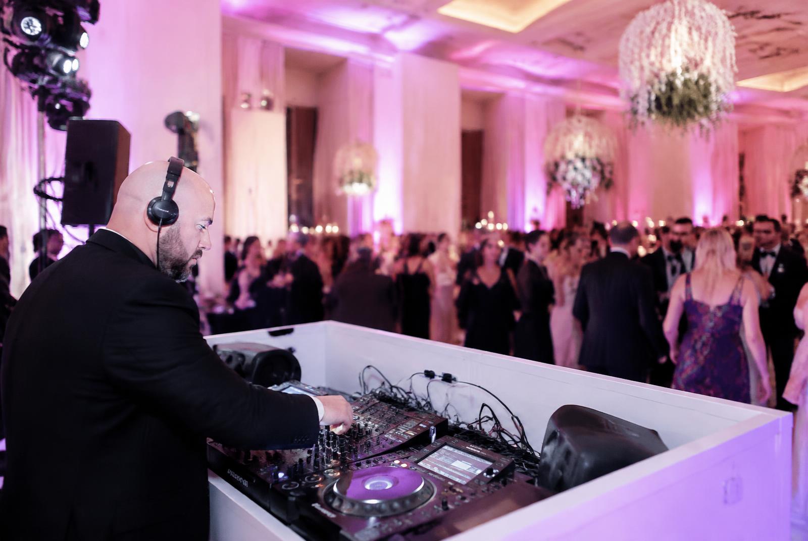 DJ mixing at an elegant ballroom event
